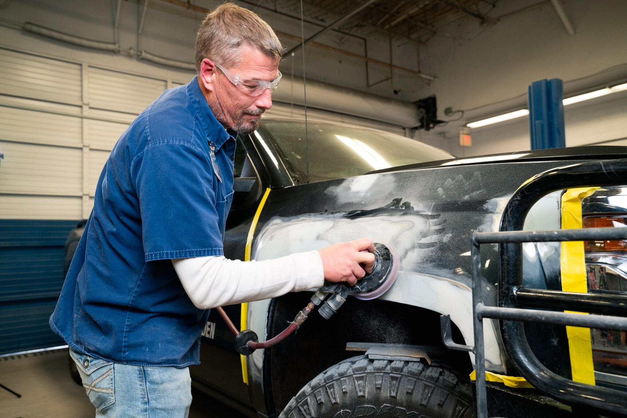 Student earning his Auto Body Repair certification